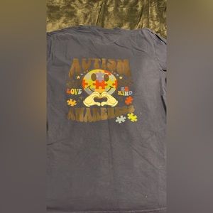 Autism awareness shirt. Has the same print on the front where a pocket would go